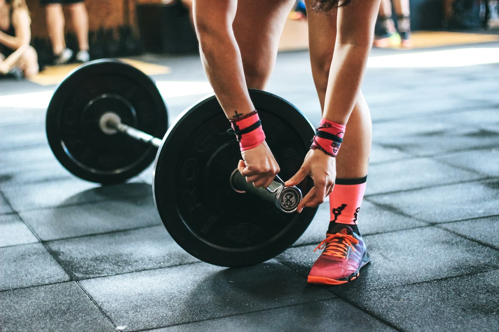 Female athlete performing lateral agility drill for ACL prevention training