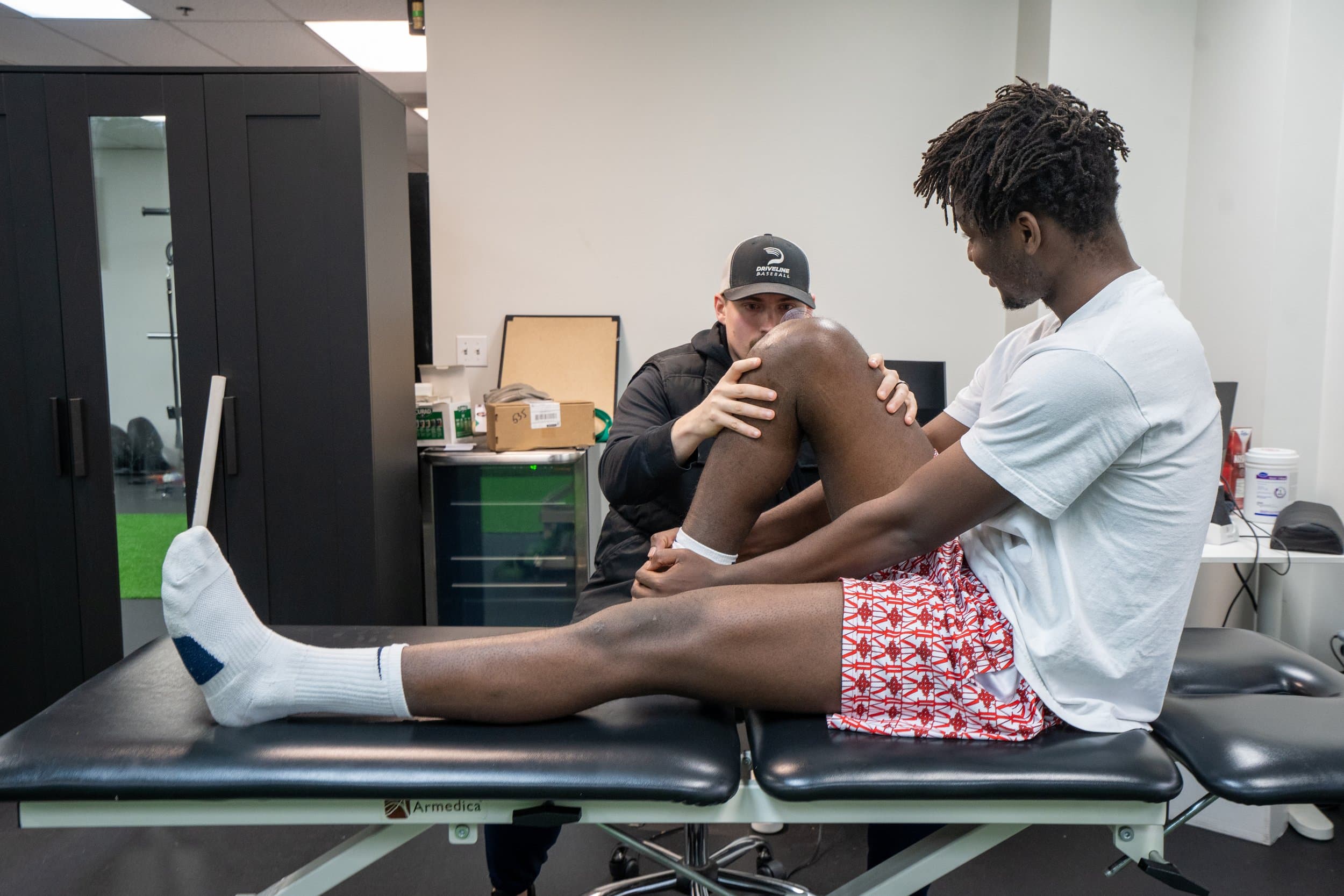 Athlete training with rehab equipment
